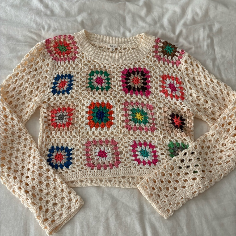 Holey patterned sweater